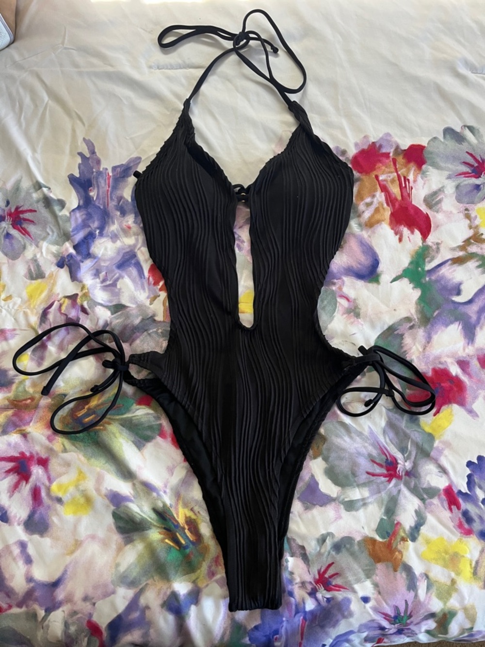 Women’s Plunging Black One-Piece Swimsuit with Side cut outs size small